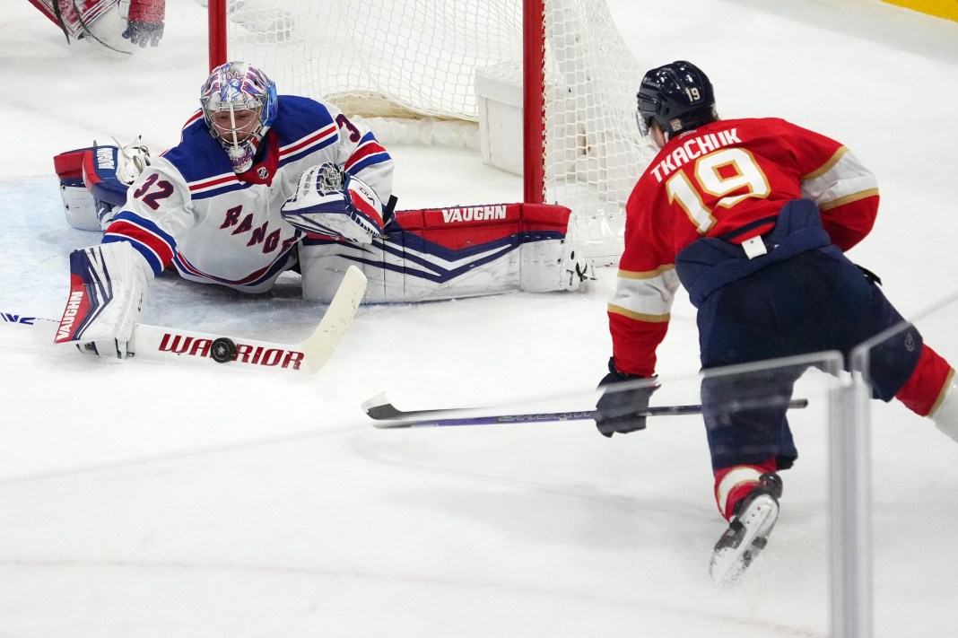 New York Rangers goaltender Jonathan Quick blocks a shot by Panthers' Matthew Tkachuk.