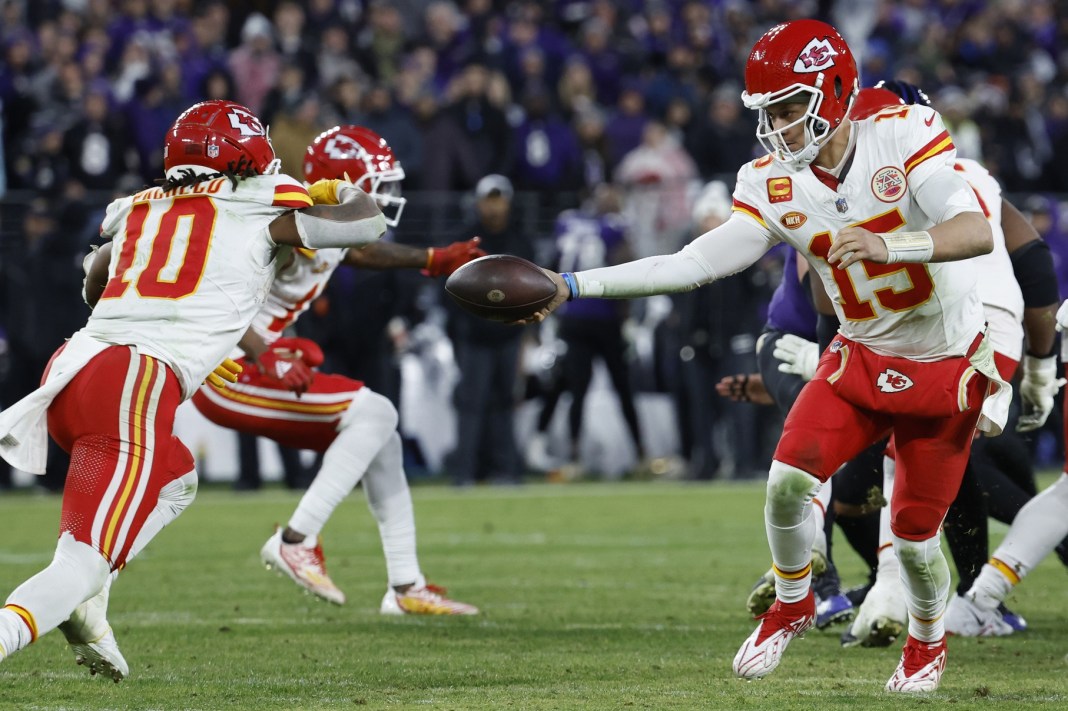 NFL: AFC Championship-Kansas City Chiefs at Baltimore Ravens Chiefs quarterback Patrick Mahomes hands the ball to running back Isiah Pacheco against the Ravens in the AFC Championship.