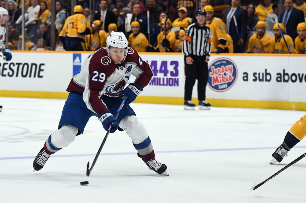 NHL: Colorado Avalanche at Nashville Predators Colorado Avalanche center Nathan MacKinnon plays the puck against Montreal Canadiens' Mike Matheson.