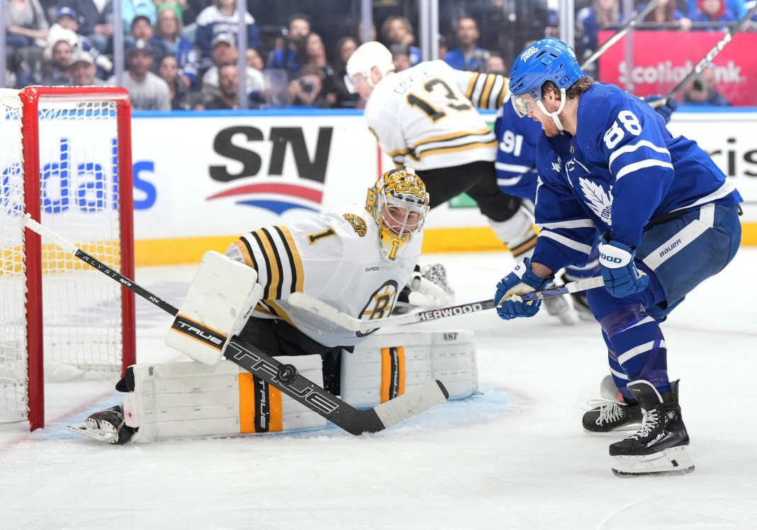 NHL: Stanley Cup Playoffs-Boston Bruins at Toronto Maple Leafs Toronto Maple Leafs right wing William Nylander battles for the puck in front of Boston Bruins goaltender in the 2024 Stanley Cup Playoffs.