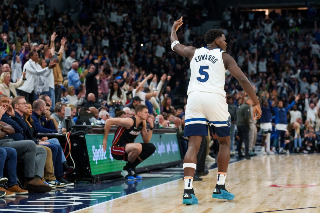 NBA: Miami Heat at Minnesota Timberwolves Minnesota Timberwolves guard Anthony Edwards (5) celebrates a three pointer with fans against the Miami Heat