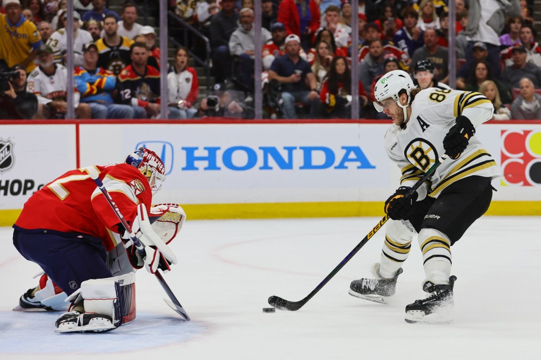 NHL: Stanley Cup Playoffs-Boston Bruins at Florida Panthers Boston Bruins right wing David Pastrnak shoots the puck against Florida Panthers goaltender Sergei Bobrovsky in the Stanley Cup Playoffs.