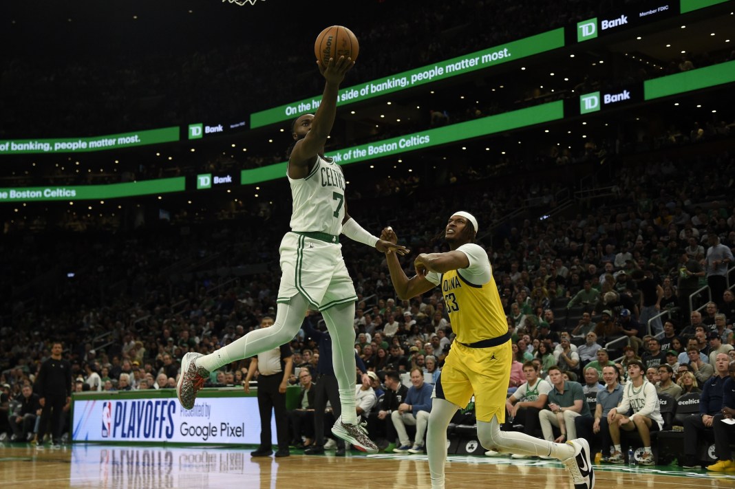 NBA: Playoffs-Indiana Pacers at Boston Celtics Boston Celtics guard Jaylen Brown shoots the ball against Indiana Pacers center Myles Turner in game one of the 2024 NBA playoffs.