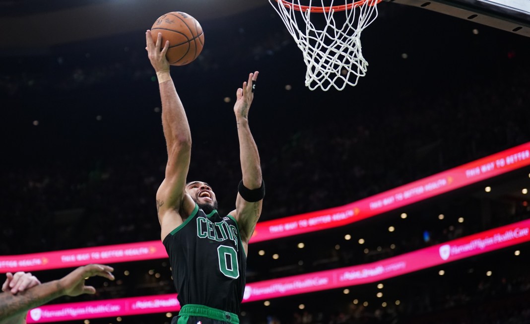 NBA: Playoffs-Cleveland Cavaliers at Boston Celtics Boston Celtics forward Jayson Tatum (0) drives to the basket against the Cleveland Cavaliers in the third quarter during game five of the second round for the 2024 NBA playoffs at TD Garden