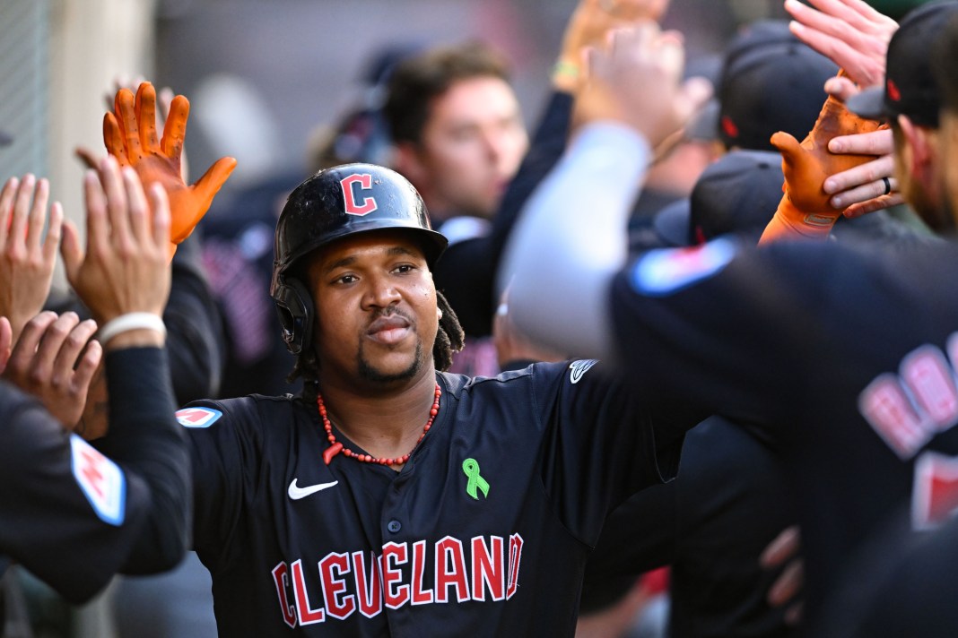 MLB: Cleveland Guardians at Los Angeles Angels jose ramirez high fives teammates
