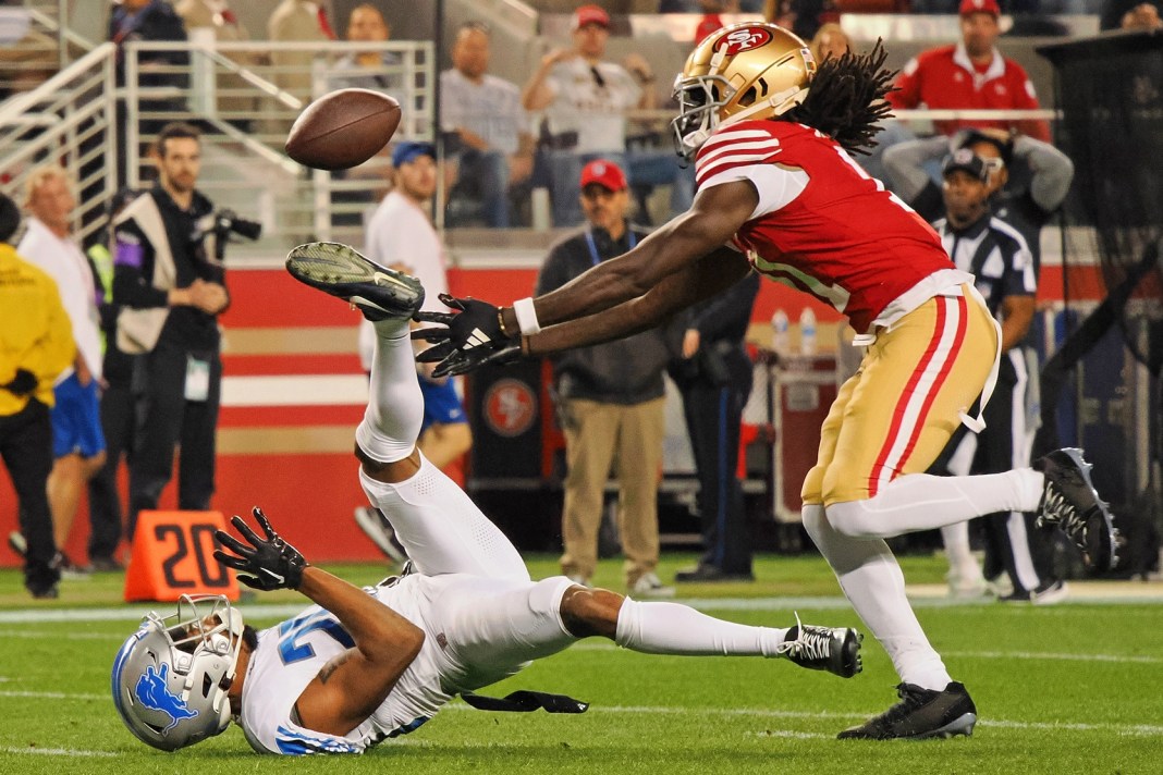 NFL: NFC Championship-Detroit Lions at San Francisco 49ers San Francisco 49ers wide receiver Brandon Aiyuk (11) reaches for a ball that bounced off the face mask of Detroit Lions cornerback Kindle Vildor (29)