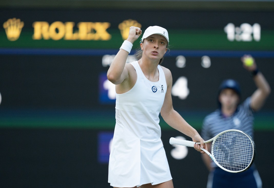 Tennis: Wimbledon Iga Swiatek reacts to a point won in her match at Wimbledon in 2023.