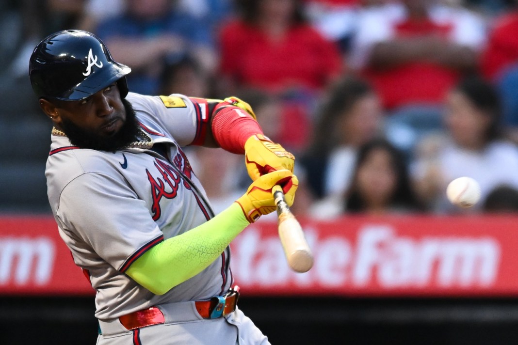 Atlanta Braves designated hitter Marcell Ozuna (20) singles during the third inning of the game against the Los Angeles Angels at Angel Stadium in Anaheim, California, on August 17, 2024.