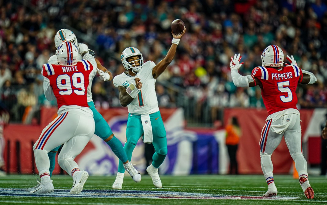 Miami Dolphins quarterback Tua Tagovailoa (1) throws a pass during the first half of the game against the New England Patriots at Gillette Stadium in Foxborough, Massachusetts, on September 17, 2023.