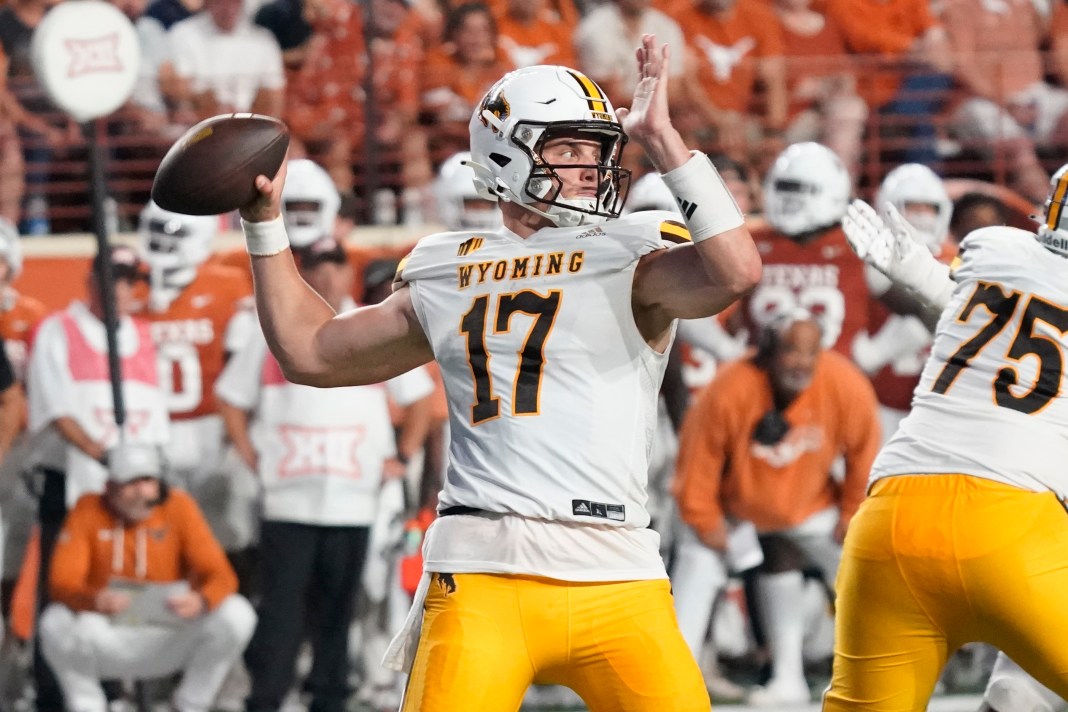 Wyoming Cowboys quarterback Evan Svoboda (17) throws a pass during the second half of the game against the Texas Longhorns at Darrell K Royal-Texas Memorial Stadium in Austin, Texas, on September 16, 2023.