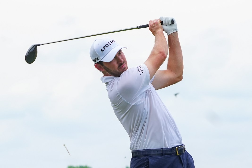 Patrick Cantlay tees off on the third hole during the third round of the Travelers Championship golf tournament at TPC River Highlands in Cromwell, Connecticut, on June 22, 2024.