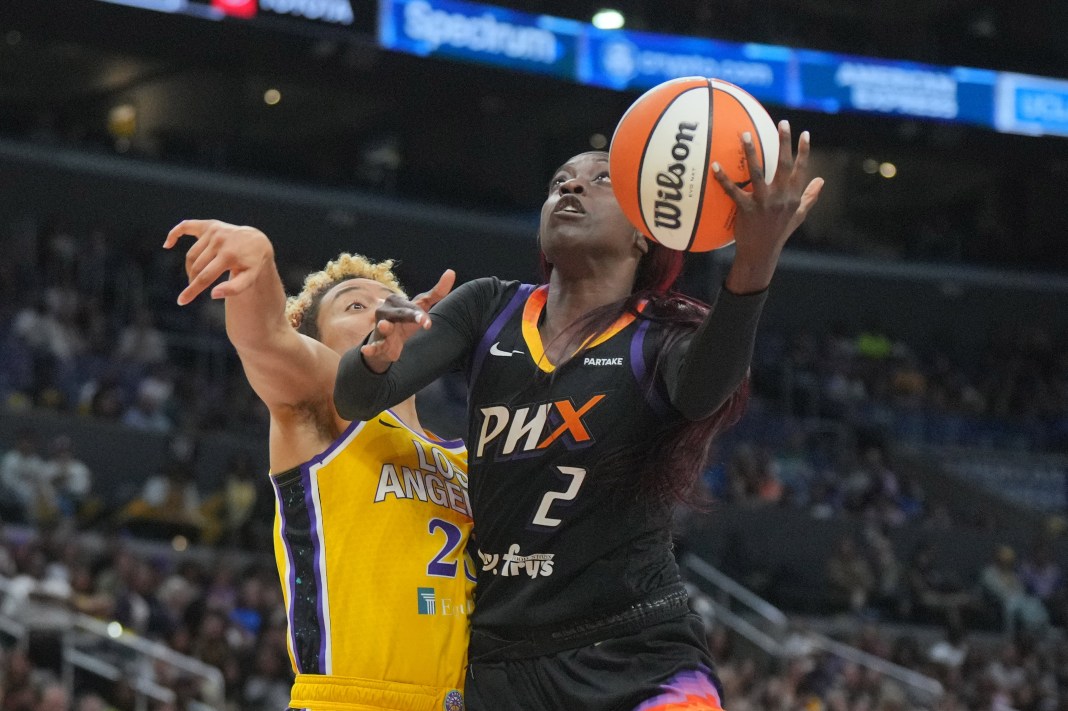 Phoenix Mercury guard Kahleah Copper (2) is defended by LA Sparks guard Layshia Clarendon (25) during the first half of the game at Crypto.com Arena in Los Angeles, California, on July 7, 2024.