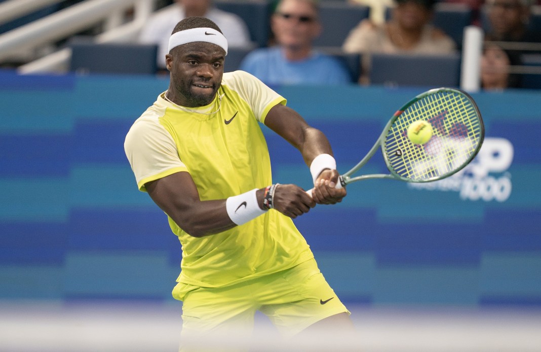 Tennis: Cincinnati Open Frances Tiafoe hits a backhand in his match against Lorenzo Musetti at the Cincinnati Open.