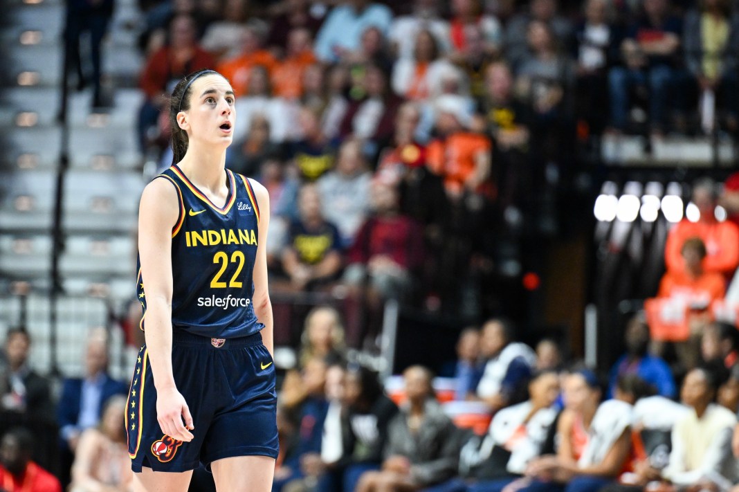 Indiana Fever guard Caitlin Clark (22) looks at the video board during the fourth quarter against the Connecticut Sun in Game 1 of the first round of the 2024 WNBA Playoffs at Mohegan Sun Arena on September 22, 2024.