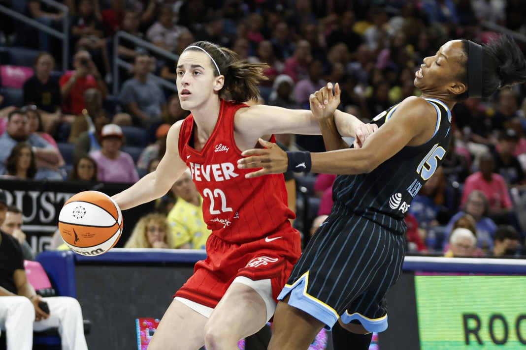 Indiana Fever guard Caitlin Clark (22) drives to the basket against Chicago Sky guard Lindsay Allen (15) during the first half at Wintrust Arena in Chicago on August 30, 2024.
