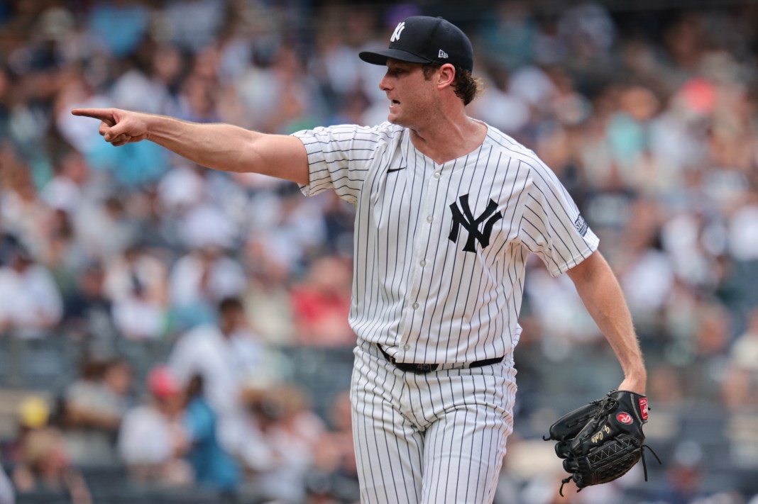 New York Yankees starting pitcher Gerrit Cole (45) points toward home plate during the second inning against the Toronto Blue Jays at Yankee Stadium on August 4, 2024.