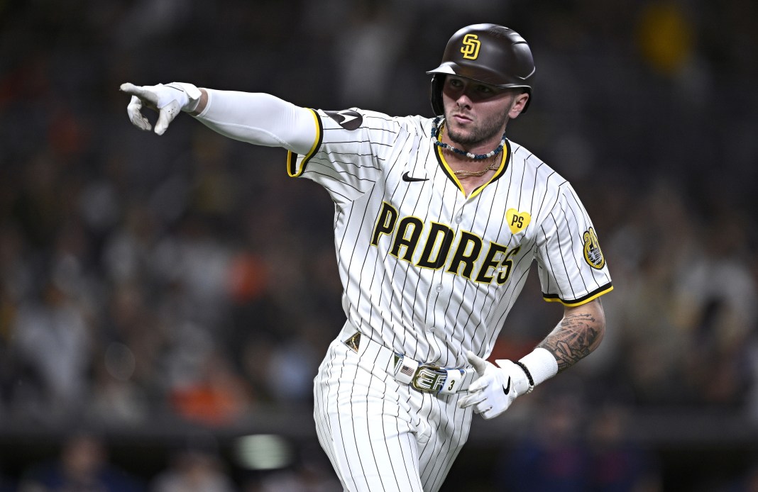 San Diego Padres center fielder Jackson Merrill (3) gestures toward the Padres dugout after hitting a home run against the Houston Astros during the fourth inning at Petco Park on September 16, 2024.