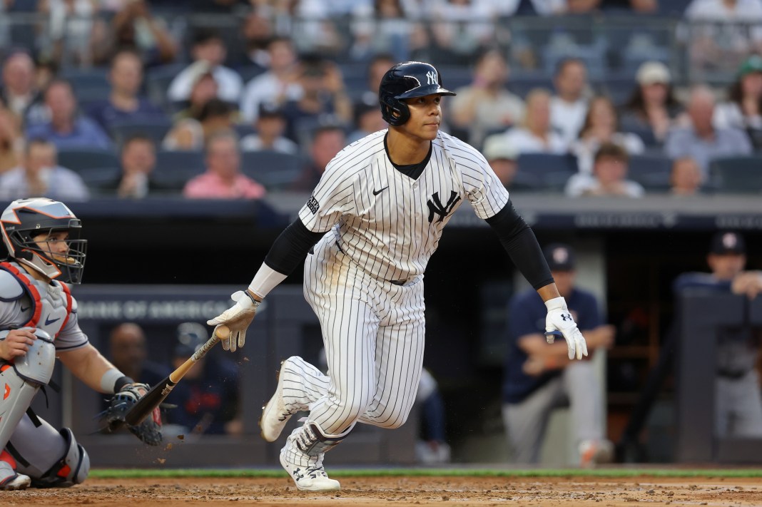MLB: Houston Astros at New York Yankees New York Yankees right fielder Juan Soto (22) follows through on an RBI infield single during the second inning against the Houston Astros at Yankee Stadium on May 8, 2024.