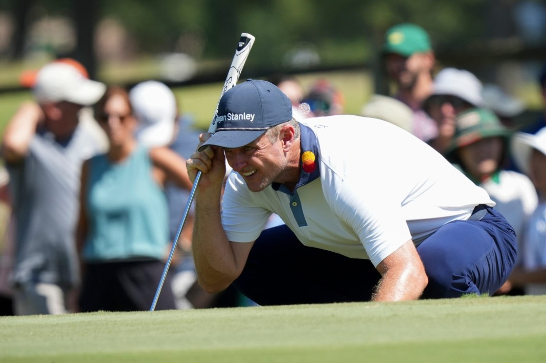 Justin Rose lines up a putt on the 12th hole during the third round of the FedEx St. Jude Championship at TPC Southwind in Memphis, Tennessee, on Saturday, August 17, 2024.