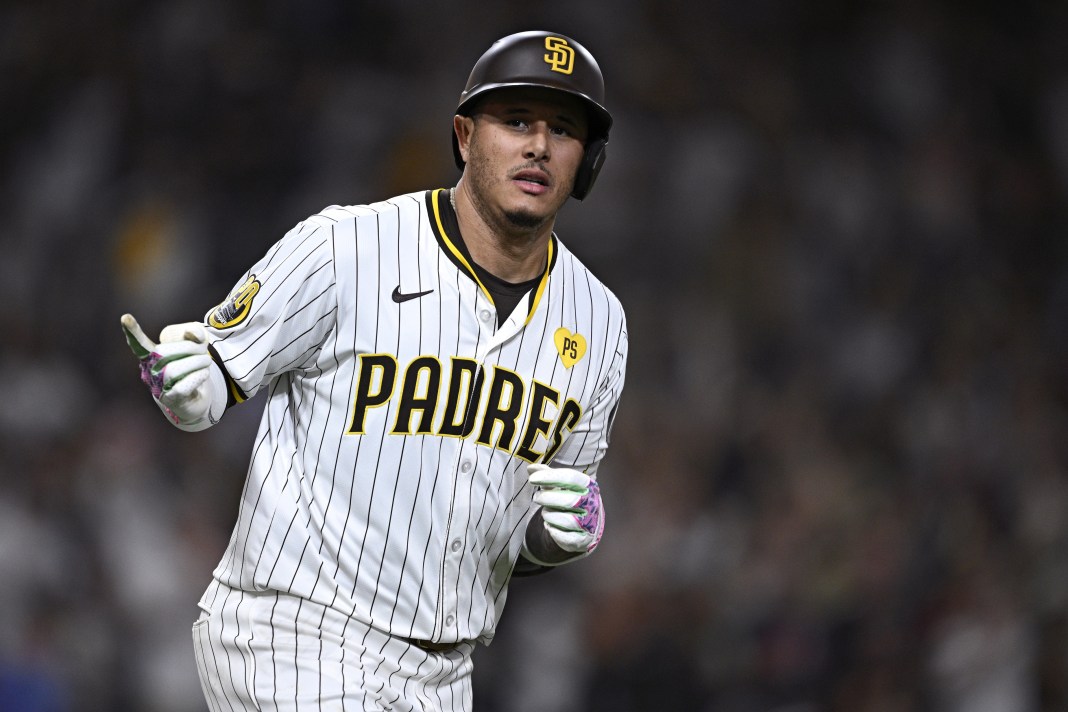 San Diego Padres third baseman Manny Machado (13) rounds the bases after hitting a two-run home run against the Minnesota Twins during the seventh inning at Petco Park on August 20, 2024.