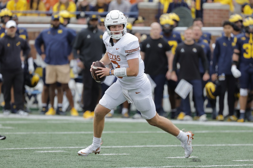Texas Longhorns quarterback Quinn Ewers (3) passes in the second half against the Michigan Wolverines at Michigan Stadium on September 7, 2024.