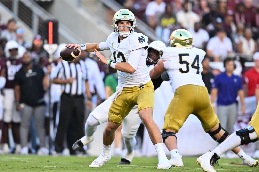 Notre Dame Fighting Irish quarterback Riley Leonard (13) attempts a pass during the first quarter against the Texas A&M Aggies at Kyle Field on August 31, 2024.