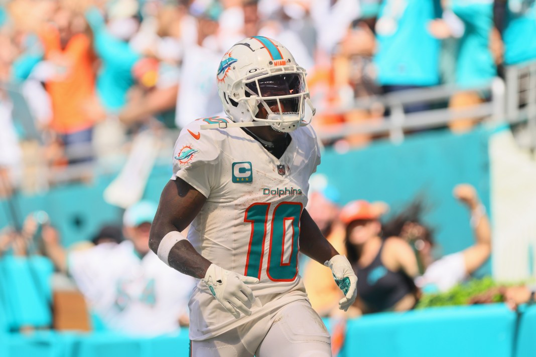 NFL: Jacksonville Jaguars at Miami Dolphins Miami Dolphins wide receiver Tyreek Hill (10) runs in the end zone after scoring a touchdown against the Jacksonville Jaguars during the third quarter at Hard Rock Stadium on September 8, 2024.