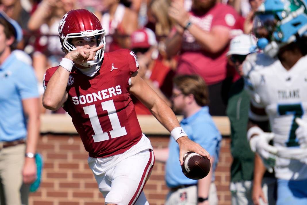 Oklahoma Sooners quarterback Jackson Arnold (11) gestures after a run during a college football game between the University of Oklahoma Sooners (OU) and the Tulane Green Wave at Gaylord Family - Oklahoma Memorial Stadium in Norman, Oklahoma, on Saturday, September 14, 2024.