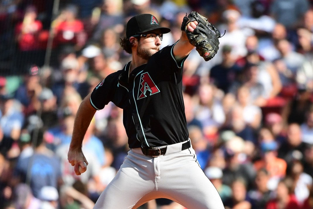 Arizona Diamondbacks starting pitcher Zac Gallen (23) pitches during the second inning against the Boston Red Sox at Fenway Park on August 24, 2024. mlb picks