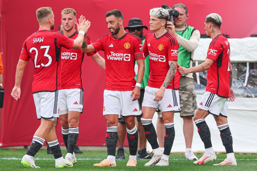 Manchester United midfielder Bruno Fernandes (8) celebrates his goal with teammates during the first half against Arsenal at MetLife Stadium on July 22, 2023.