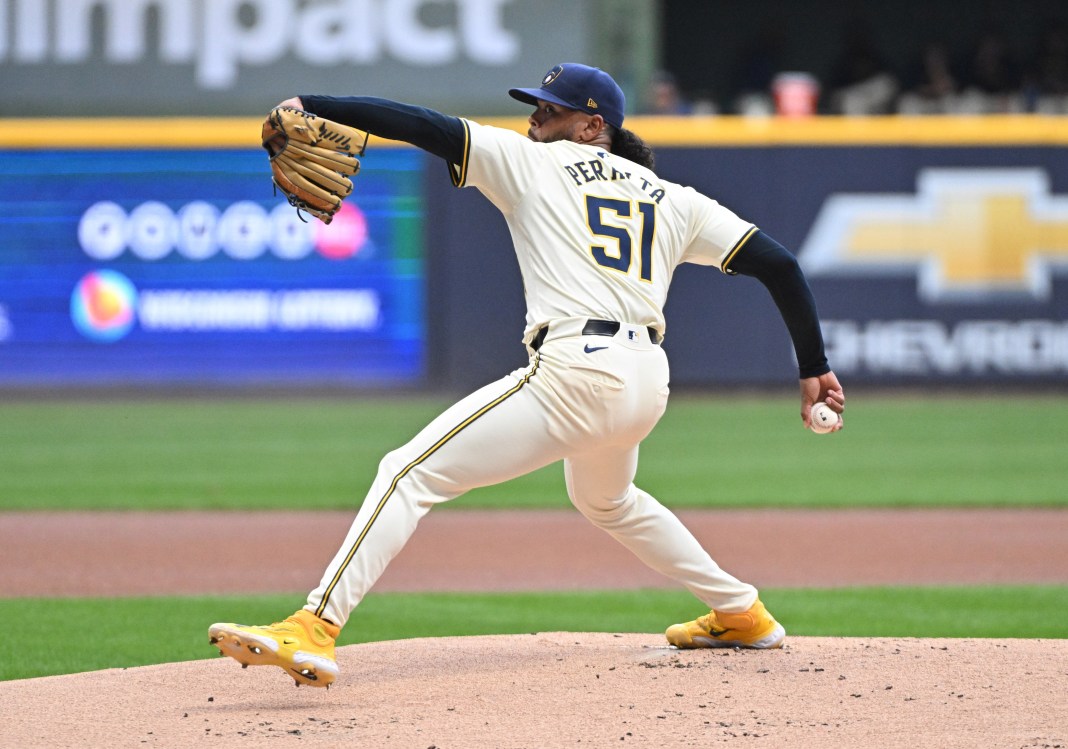 Milwaukee Brewers pitcher Freddy Peralta (51) delivers a pitch during the first inning against the Los Angeles Dodgers at American Family Field on August 12, 2024.