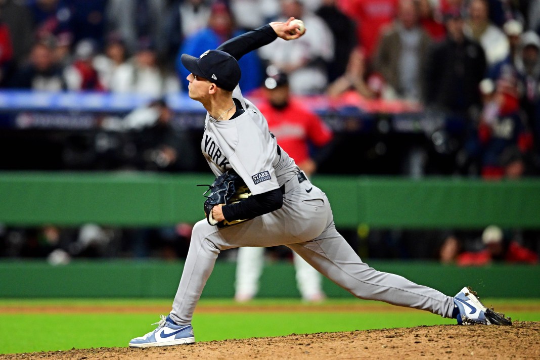 MLB: ALCS-New York Yankees at Cleveland Guardians New York Yankees pitcher Luke Weaver (30) pitches during the ninth inning against the Cleveland Guardians