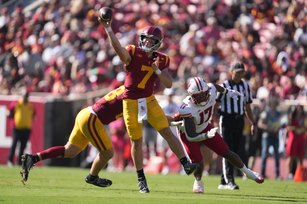 Southern California Trojans quarterback Miller Moss (7) throws a pass during the second half against the Wisconsin Badgers at United Airlines Field at Los Angeles Memorial Coliseum on September 28, 2024.