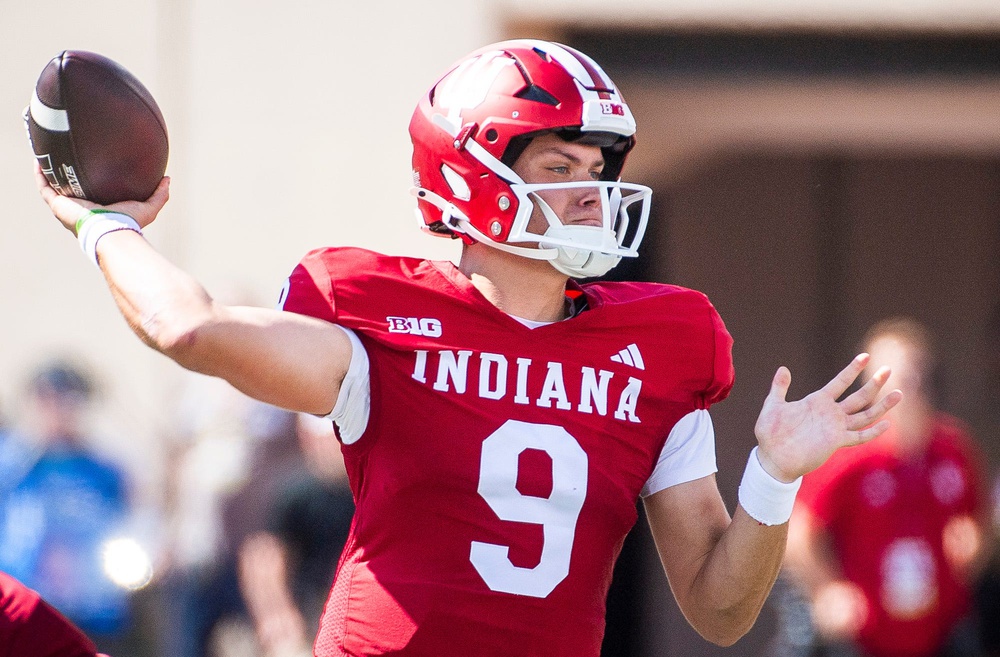 Indiana's Kurtis Rourke (9) passes during the Indiana versus Charlotte football game at Memorial Stadium