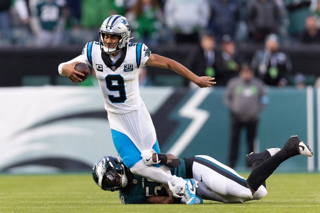 Philadelphia Eagles linebacker Jalyx Hunt tackles Carolina Panthers quarterback Bryce Young