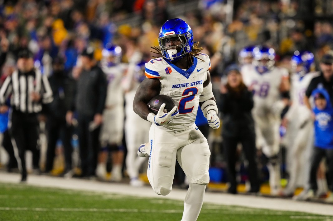 Boise State Broncos running back and Heisman Trophy candidate Ashton Jeanty runs for a touchdown against the Wyoming Cowboys