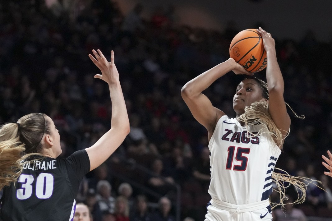 Gonzaga Bulldogs forward Yvonne Ejim (15) takes a shot against Portland Pilots forward Lucy Cochrane (30) during the second half of the WCC Basketball Championship final at Orleans Arena on March 12, 2024
