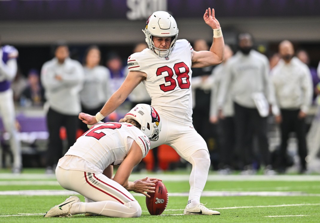 NFL: Arizona Cardinals at Minnesota Vikings Arizona Cardinals place kicker Chad Ryland kicks a field goal as punter Blake Gillikin holds during the second quarter against the Minnesota Vikings