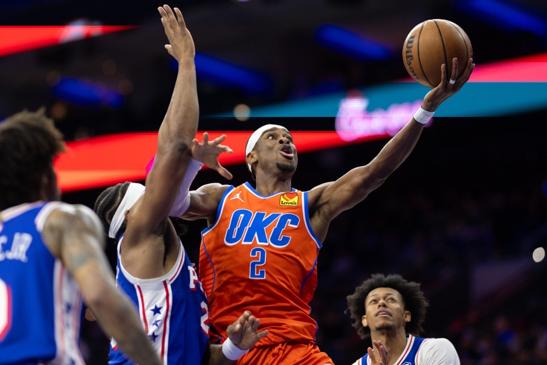 NBA: Oklahoma City Thunder at Philadelphia 76ers Oklahoma City Thunder guard Shai Gilgeous-Alexander (2) drives for a shot past Philadelphia 76ers forward Guerschon Yabusele (28) during the third quarter at Wells Fargo Center on January 14, 2025
