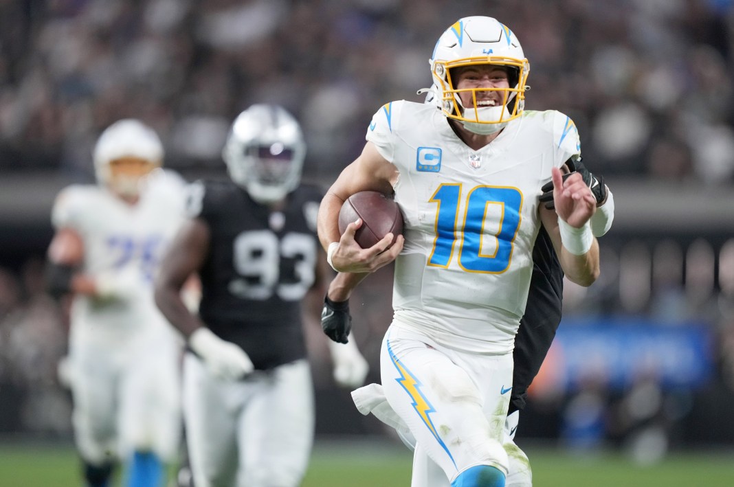 NFL: Los Angeles Chargers at Las Vegas Raiders Los Angeles Chargers quarterback Justin Herbert (10) runs for 41 yards during the second half against the Las Vegas Raiders at Allegiant Stadium on January 5, 2025