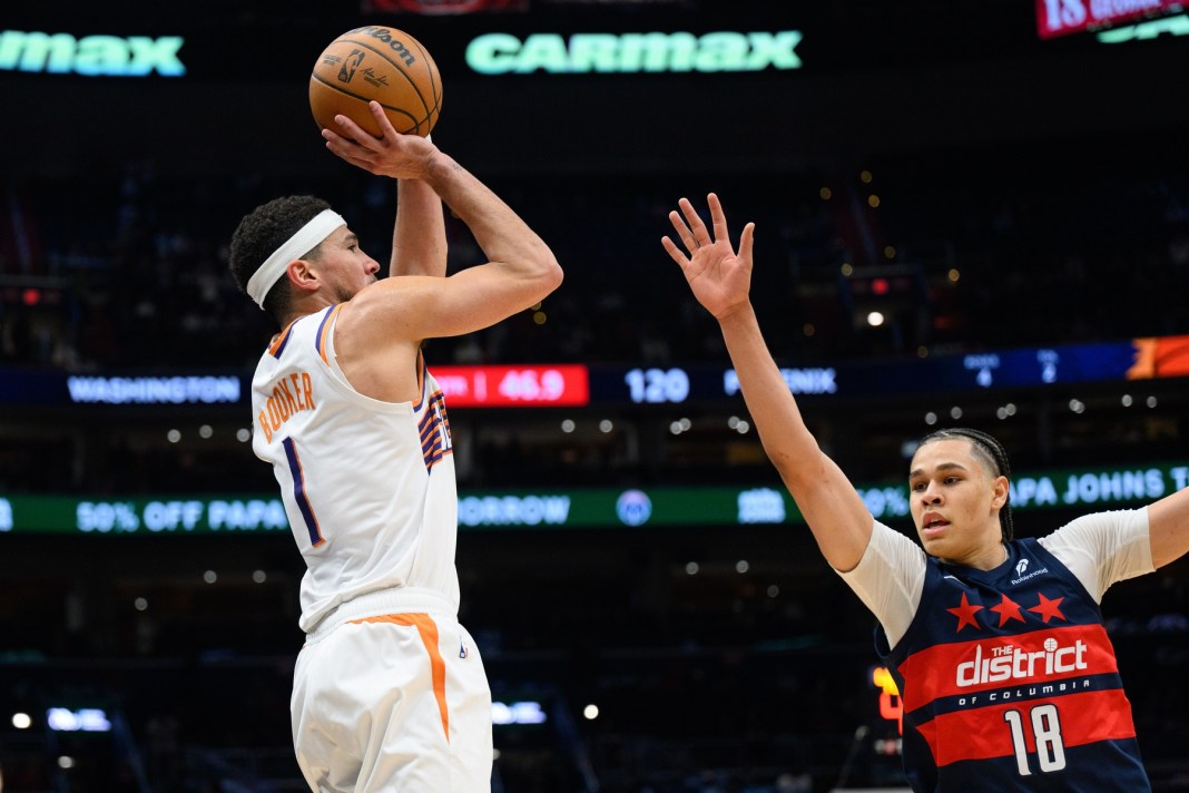 NBA: Phoenix Suns at Washington Wizards Suns star Devin Booker takes a jumper against the Wizards during the 2024-25 NBA season.