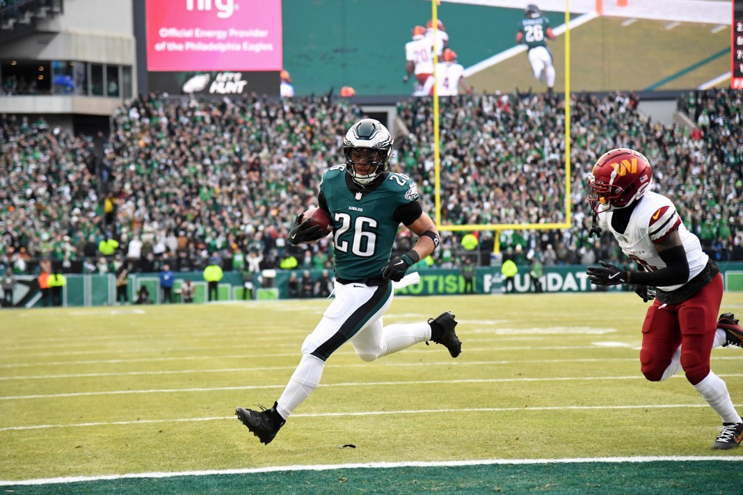 NFL: NFC Championship-Washington Commanders at Philadelphia Eagles Philadelphia Eagles running back Saquon Barkley (26) runs with the ball for a touchdown during the first half of the NFC Championship game against the Washington Commanders at Lincoln Financial Field on January 26, 2025