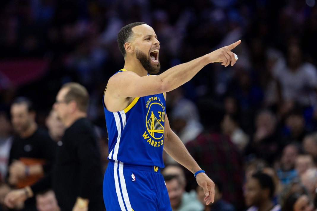 Golden State Warriors guard Stephen Curry (30) reacts after his dunk against the Philadelphia 76ers during the fourth quarter at Wells Fargo Center on March 1, 2025.