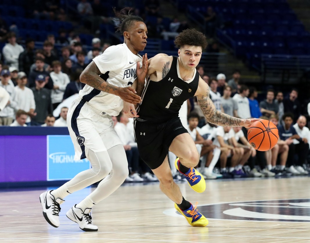 Purdue Fort Wayne guard Jalen Jackson attacks the basket against Penn State during the 2024-25 college basketball season.