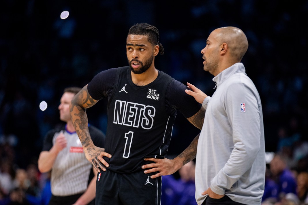 NBA: Brooklyn Nets at Charlotte Hornets Nets coach Jordi Fernandez talks to D'Angelo Russell during the 2024-25 NBA season.