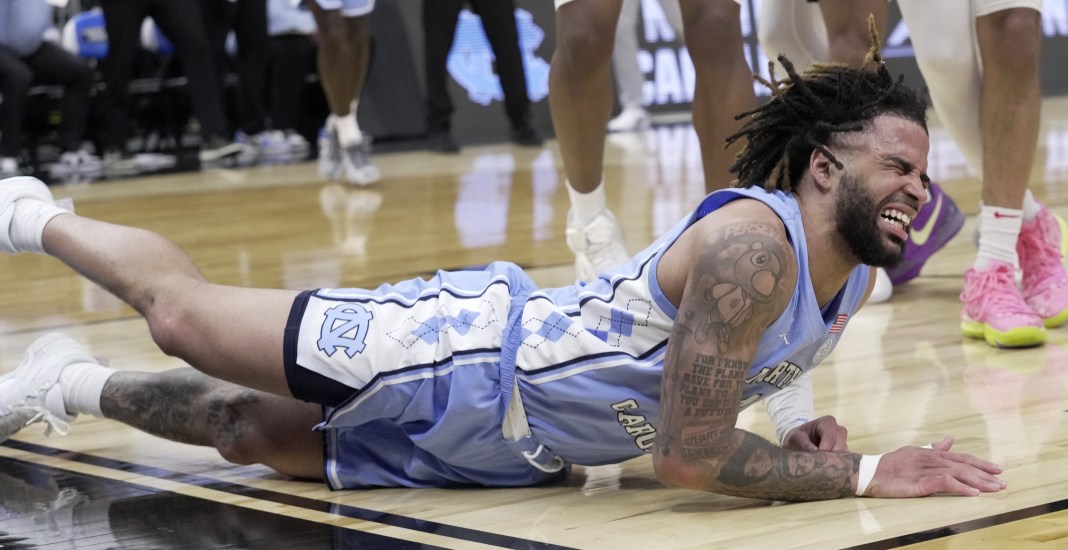 North Carolina guard RJ Davis (4) winces after being fouled during the second half of their first-round NCAA men’s basketball tournament game against Marquette at Fiserv Forum in Milwaukee, WI, on March 21, 2025.