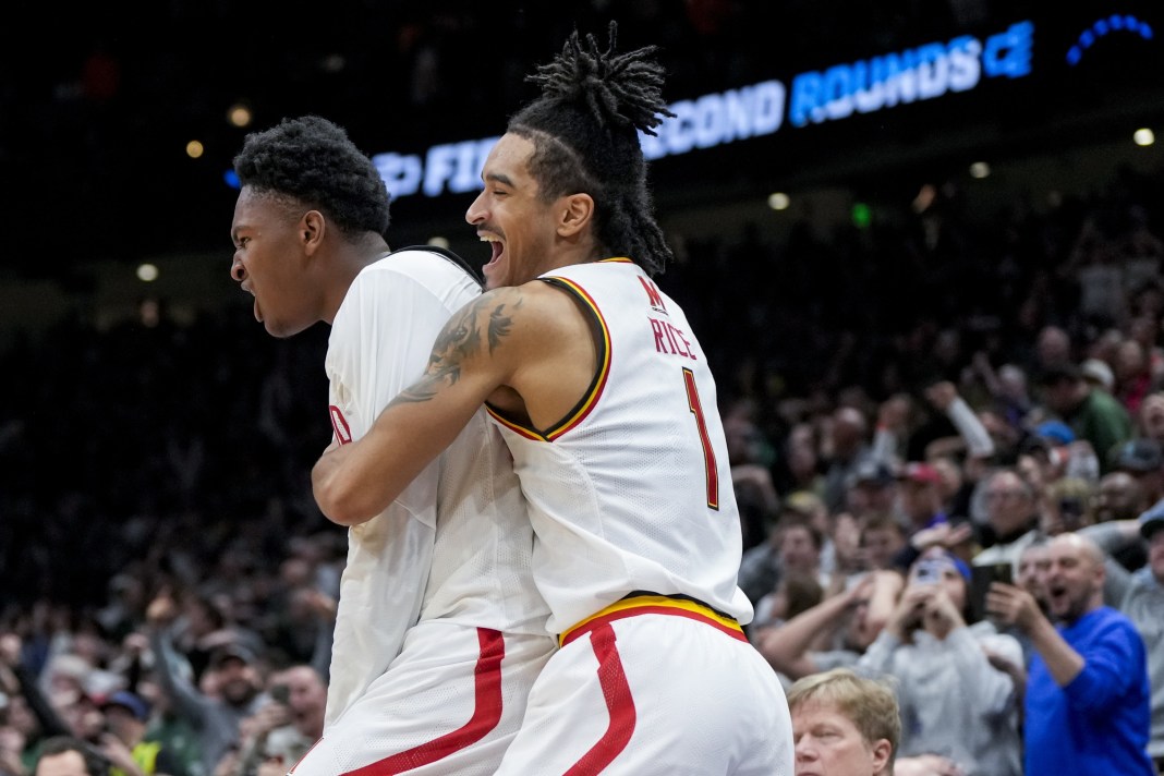 Maryland Terrapins center Derik Queen (25) celebrates with teammates after scoring the game-winning shot against the Colorado State Rams at Climate Pledge Arena in Seattle, WA, on March 23, 2025.
