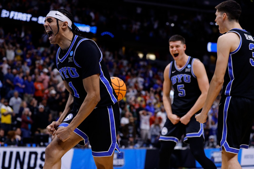 Brigham Young Cougars guard Trey Stewart (1) reacts after defeating the Wisconsin Badgers in the second round of the NCAA Tournament at Ball Arena in Denver, CO, on March 22, 2025.