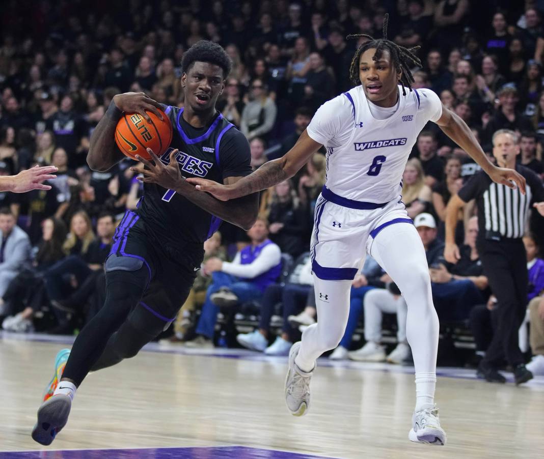 GCU guard Tyon Grant-Foster (7) dribbles against ACU guard Dontrez Williams (6) during a game at Grand Canyon University on January 16, 2025.