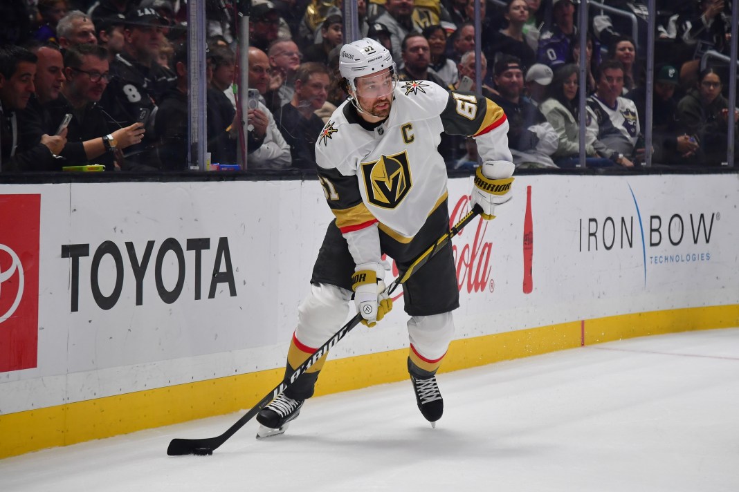 NHL: Vegas Golden Knights at Los Angeles Kings Feb 24, 2025; Los Angeles, California, USA; Vegas Golden Knights right wing Mark Stone (61) controls the puck against the Los Angeles Kings during the first period at Crypto.com Arena. Mandatory Credit: Gary A. Vasquez-Imagn Images